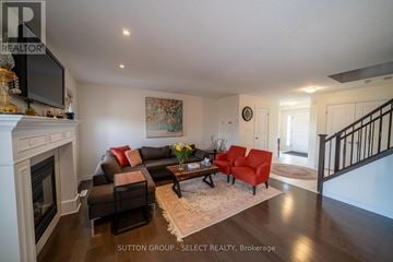 London North (North S) apartment for rent - A living room with a fireplace and a painting on the wall.