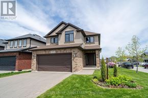 London North (North S) apartment for rent - A house with a brown garage door is for sale.