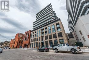 Hamilton (Beasley) condo for rent - A building with a sign that says RE/MAX REALTY SPECIALISTS INC. Brokerage.