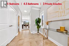 Waterloo apartment for rent - A hallway with a plant and a basket on a stand.