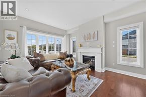 Waterloo apartment for rent - A living room with a brown leather couch and a glass coffee table.