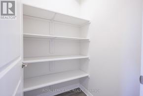 Thorold (Thorold Downtown) multi-family for rent - Empty white shelves in a room.