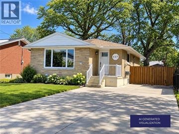 Hamilton apartment for rent - A house with a front yard and a driveway.