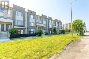 Pickering (Town Centre) townhouse for rent - A row of townhouses with a REALTOR sign on the first one.