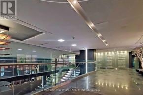 Toronto (Church-Yonge Corridor) condo for rent - A spacious interior with a glass railing and a staircase.