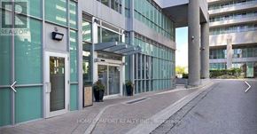 Toronto (Bendale) condo for rent - The image shows the front of a building with the sign "HOMECOMFORT REALTY INC." on it.