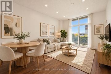 Toronto (Etobicoke West Mall) condo for rent - A well-lit living room with a large window, a sofa, a coffee table, and a dining table with chairs.