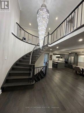 Markham (Milliken Mills East) apartment for rent - A large, well-lit foyer with a staircase and a chandelier.