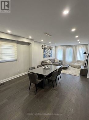 Markham (Milliken Mills East) apartment for rent - A well-lit dining room with a table set for six.