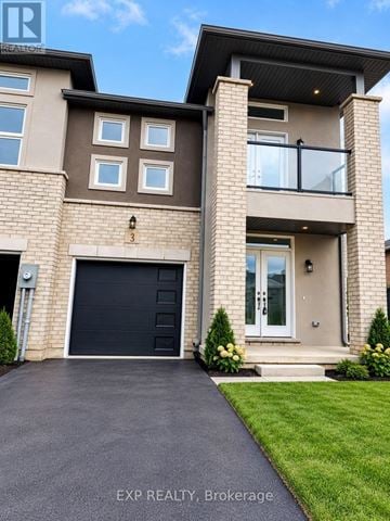 Welland (N. Welland) house for rent - A modern two-story house with a garage and a balcony on the second floor.
