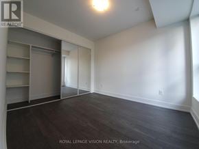 Markham (Unionville) condo for rent - A room with a sliding door and shelves.
