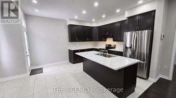 Brampton (Northwest Brampton) apartment for rent - A modern kitchen with a large island in the middle.
