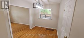 Oakville (Co Central) apartment for rent - A room with a window and a door is for sale.