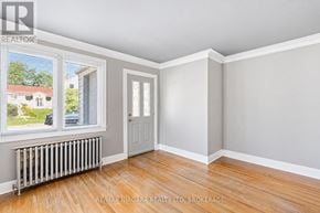 Thorold (Thorold Downtown) apartment for rent - A room with a window and a door is for rent.