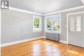 Thorold (Thorold Downtown) apartment for rent - A room with a window and a door.