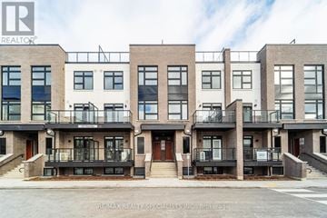 Milton (Cb Cobban) townhouse for rent - A building with the RE/MAX REALTY SPECIALISTS INC. logo on it.