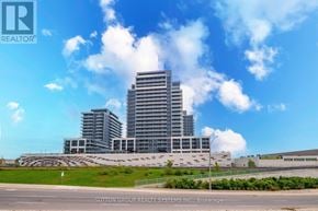 Milton (Tm Timberlea) condo for rent - A large building with a flat roof is under construction.