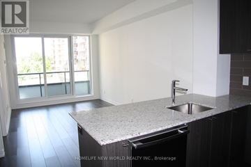 Toronto (Bayview Village) condo for rent - A kitchen with a sink and a window.