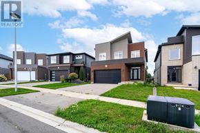 London North (North I) apartment for rent - A row of houses with a REALTOR® sign in the foreground.