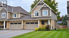 Grey Highlands townhouse for rent - A two-story house with a garage is for sale by CITYSCAPE REAL ESTATE LTD.