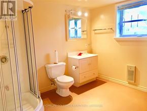 Toronto (Willowdale West) apartment for rent - A white toilet and sink in a bathroom.