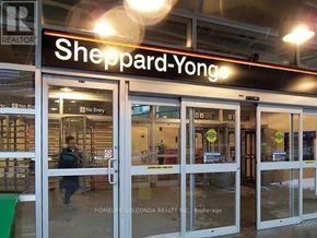 Toronto (Willowdale West) apartment for rent - The front of a real estate office named Sheppard-Yong.