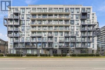 Brampton (Northwest Brampton) condo for rent - A large, modern apartment building with balconies and multiple floors.