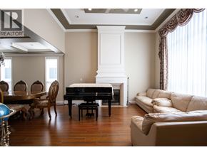 Richmond apartment for rent - A living room with a piano and a fireplace.