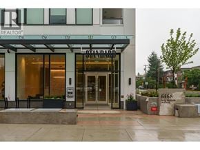 Burnaby apartment for rent - The front of a building with a glass door and a sign that says "The O'Hara".
