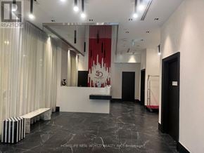 Toronto (Church-Yonge Corridor) condo for rent - A modern office space with a black and white color scheme.