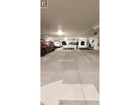 Richmond apartment for rent - A parking garage with the year 2022 painted on the ground.