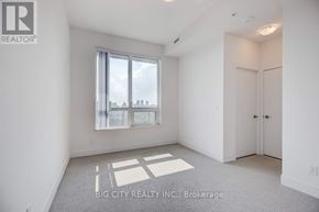 Toronto (Bayview Village) condo for rent - A realtor photo of a white room with a window and a door.