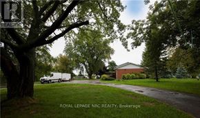 Lincoln (Beamsville) apartment for rent - A white van is parked in a driveway.