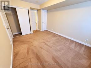 Markham (Unionville) condo for rent - A room with beige carpeting and white walls is on the market with Royal LePage Vision Realty.