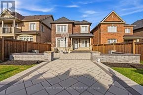 Oakville (Go Glenorchy) apartment for rent - A row of houses with a stone walkway in front.