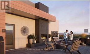 Milton (Walker) condo for rent - A modern house with a balcony and two people standing on it.