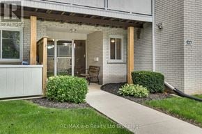 Woodstock (Woodstock - North) multi-family for rent - A house with a realtor sign on the front.