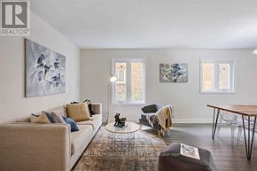 Mississauga (Meadowvale) apartment for rent - A living room with a couch, a chair, and a coffee table.