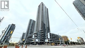 Mississauga (Hurontario) condo for rent - A tall building under construction with the logo "REALTOR" on the top left corner.