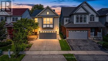 Waterloo apartment for rent - A row of houses with the text HOMELIFE/MIRACLE REALTY LTD. Brokerage.