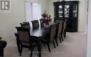 Hamilton (Hannon) apartment for rent - A dining room with a table set for six.