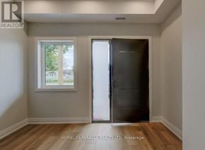 Kitchener duplex for rent - A room with a door and a window.