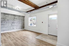 Fort Erie (Crystal Beach) multi-family for rent - A room with a wooden floor and a white door.