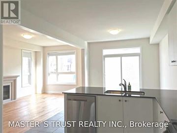 Richmond Hill townhouse for rent - A kitchen with a sink and a window.