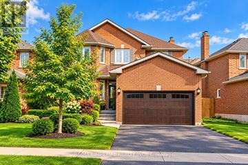 Newmarket (Gorham-College Manor) apartment for rent - A large, well-maintained house with a brick facade and a large driveway.