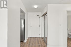 Mississauga (Cooksville) condo for rent - A white bathroom with a toilet and sink.