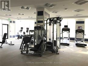 Markham (Unionville) condo for rent - A gym with a variety of equipment including treadmills, weights, and exercise machines.