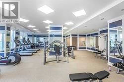 Markham (Unionville) condo for rent - A gym with a variety of equipment including treadmills, weights, and exercise machines.