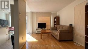 Markham (Village Green-South Unionville) apartment for rent - A living room with a fireplace and a couch.