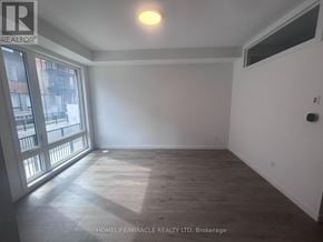 Markham (Middlefield) townhouse for rent - A room with a window and a door is for rent.